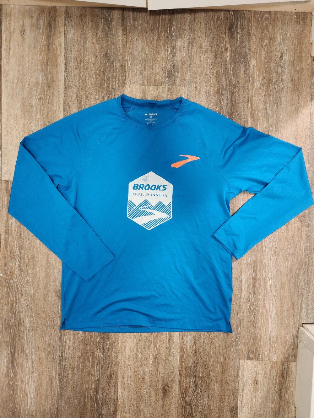 Brooks Blue Long Sleeve Trail Runners Tee with Orange Logo